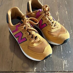 New Balance woman’s Tan and Pink Sneakers